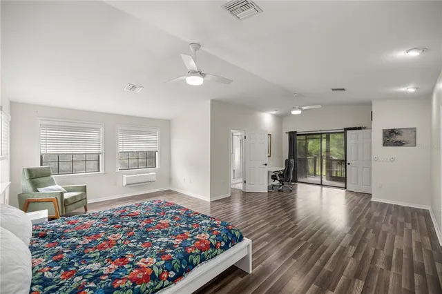 a view of balcony with wooden floor