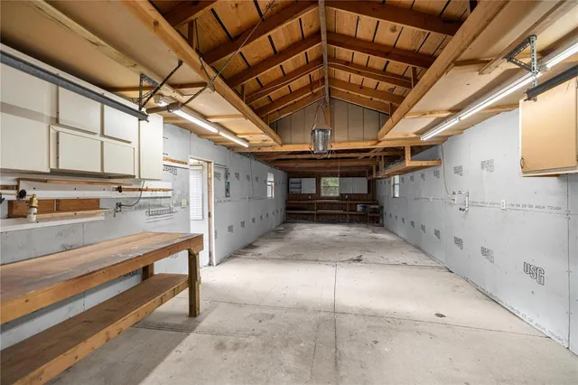 a view of a garage with wooden roof