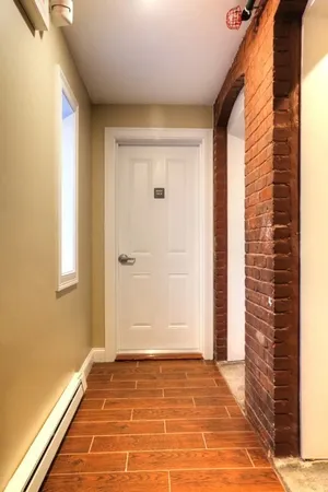 a view of an empty room and window