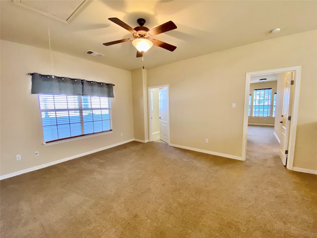 6704 Menchaca Road, Unit 8 Austin, TX 78745 - Photo 17 of 39 a view of an empty room with a window