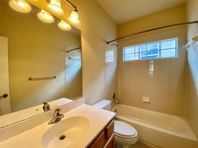 a bathroom with a sink and a toilet