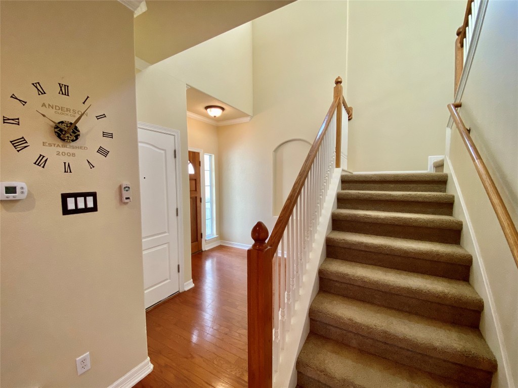6704 Menchaca Road, Unit 8 Austin, TX 78745 - Photo 4 of 39 a view of entryway and hall with wooden floor
