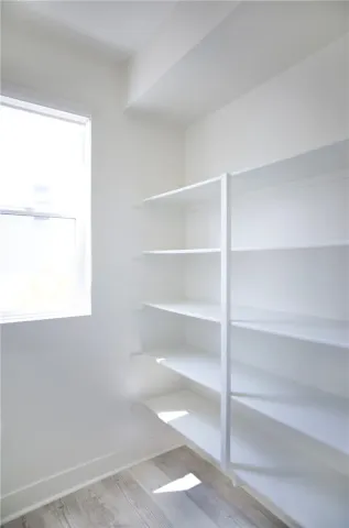 a view of a room with rack on the wall