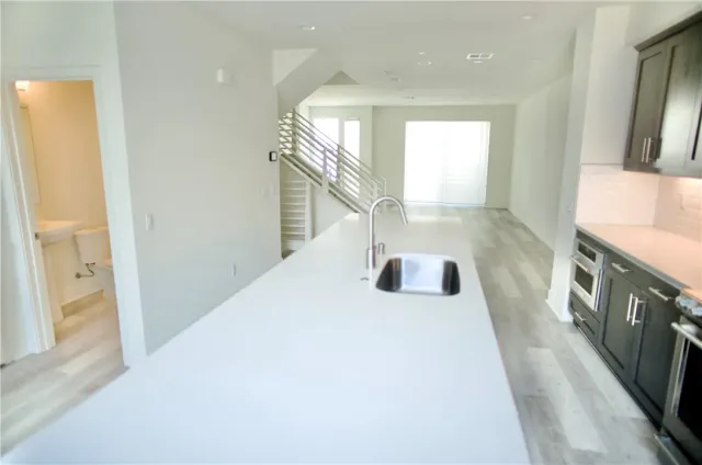 a view of a living room with a sink