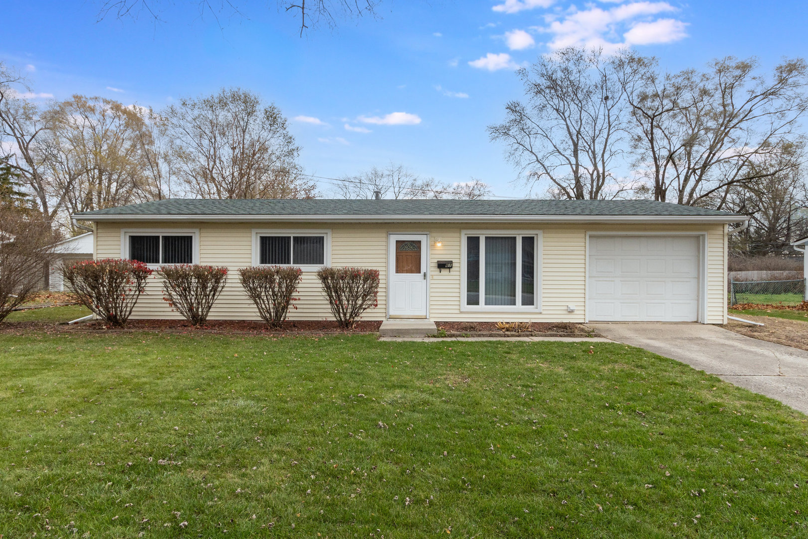 61 Sierra Road Montgomery, IL 60538 - Photo 1 of 15 a view of a house with a backyard