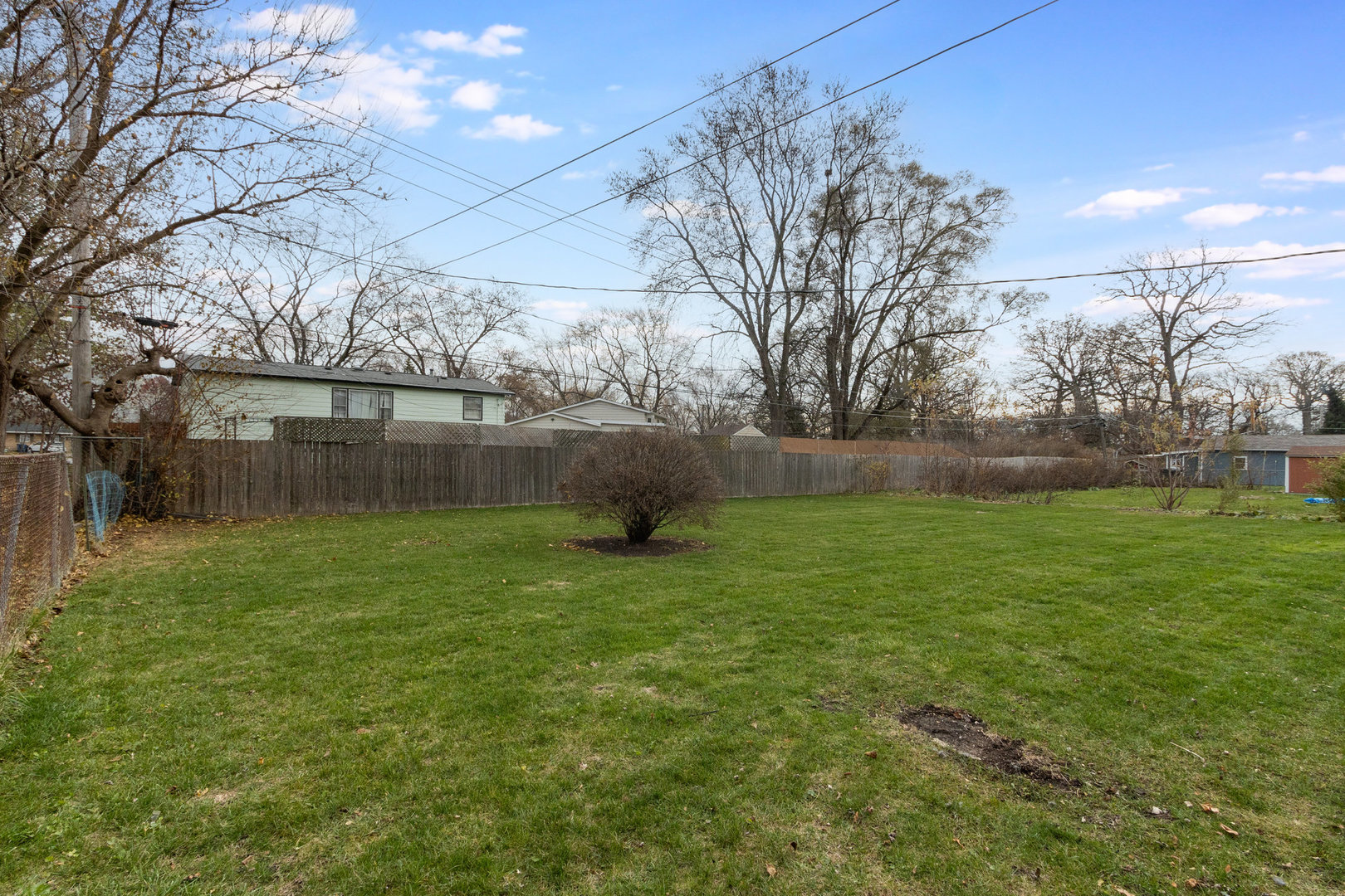 61 Sierra Road Montgomery, IL 60538 - Photo 15 of 15 a backyard of a house with lots of green space