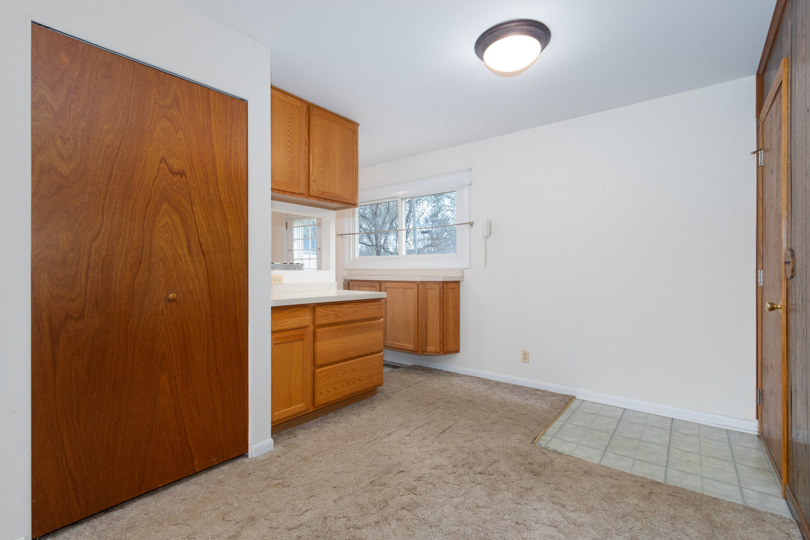 61 Sierra Road Montgomery, IL 60538 - Photo 5 of 15 an empty room with windows
