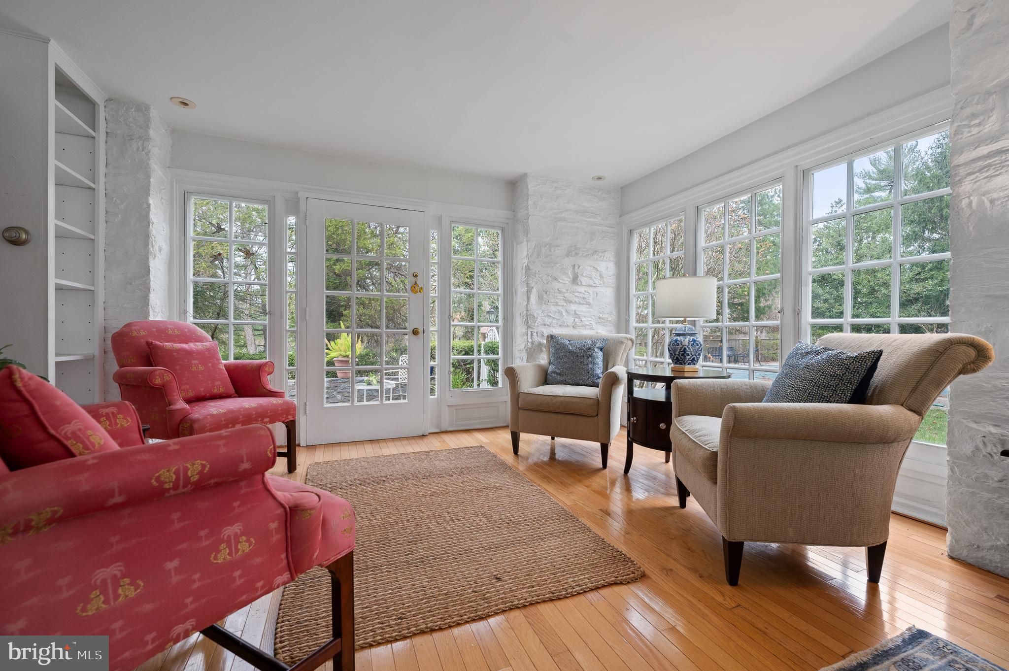3 Canterbury Lane Wayne, PA 19087 - Photo 13 of 57 a living room with furniture and a large window