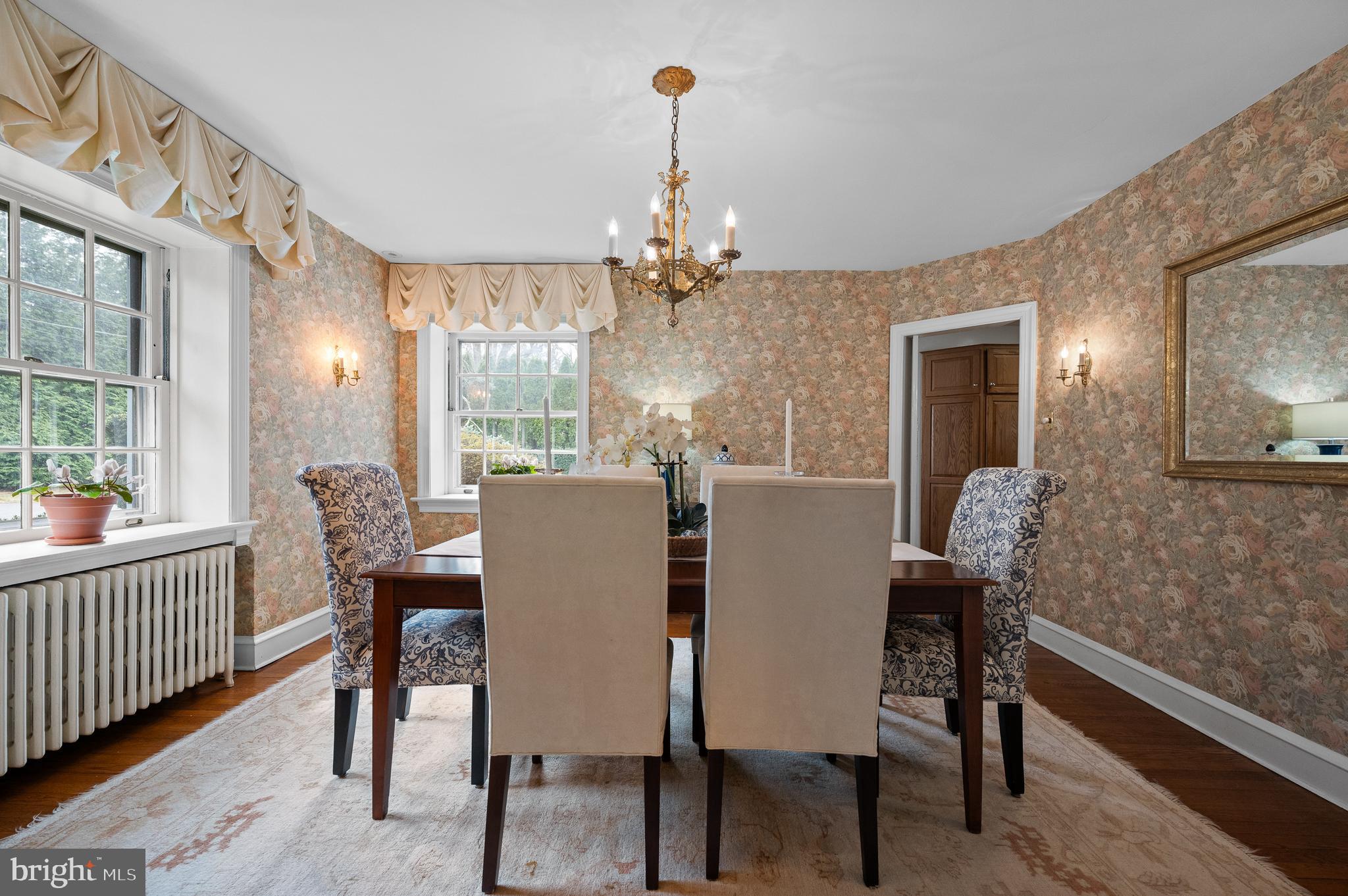 3 Canterbury Lane Wayne, PA 19087 - Photo 18 of 57 a dining room with furniture a chandelier and wooden floor
