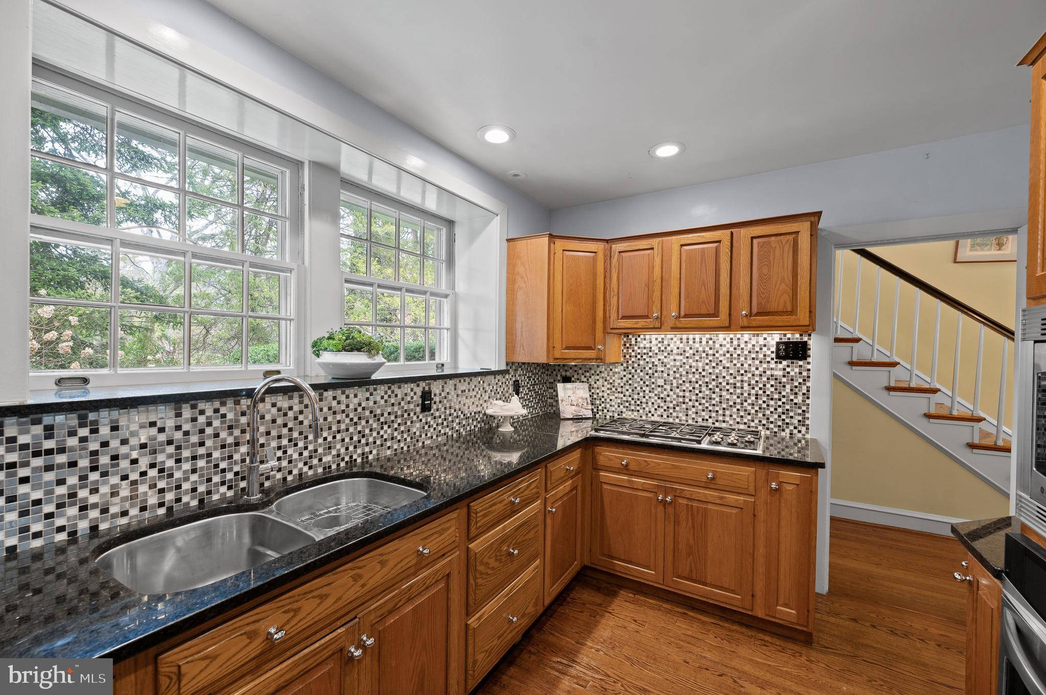 3 Canterbury Lane Wayne, PA 19087 - Photo 24 of 57 a kitchen with granite countertop a sink and a granite counter tops