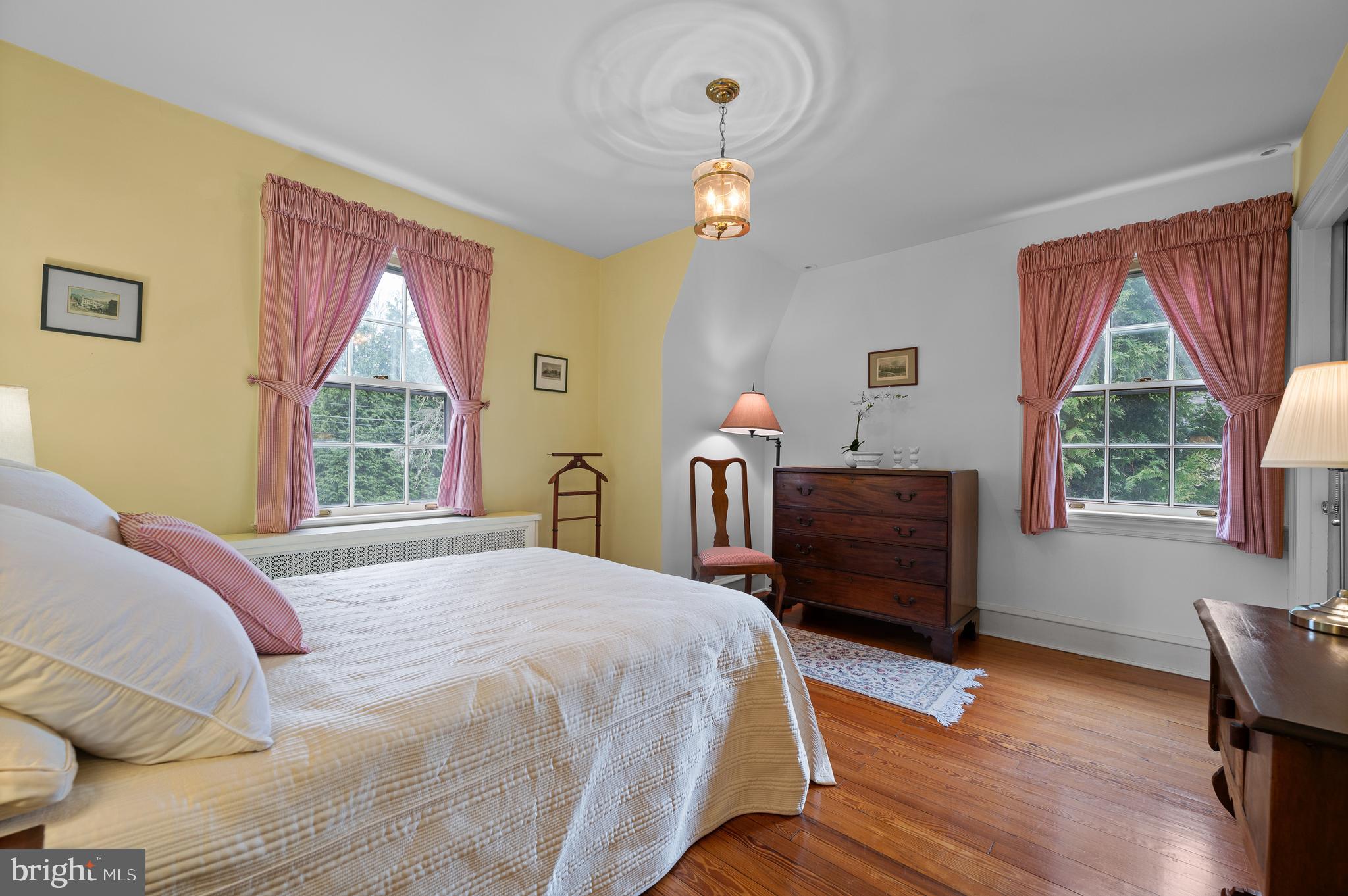 3 Canterbury Lane Wayne, PA 19087 - Photo 44 of 57 a bedroom with a bed and wooden floor