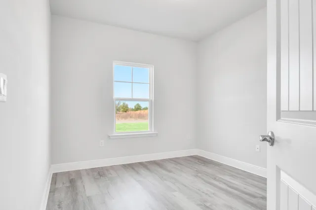 an empty room with a window