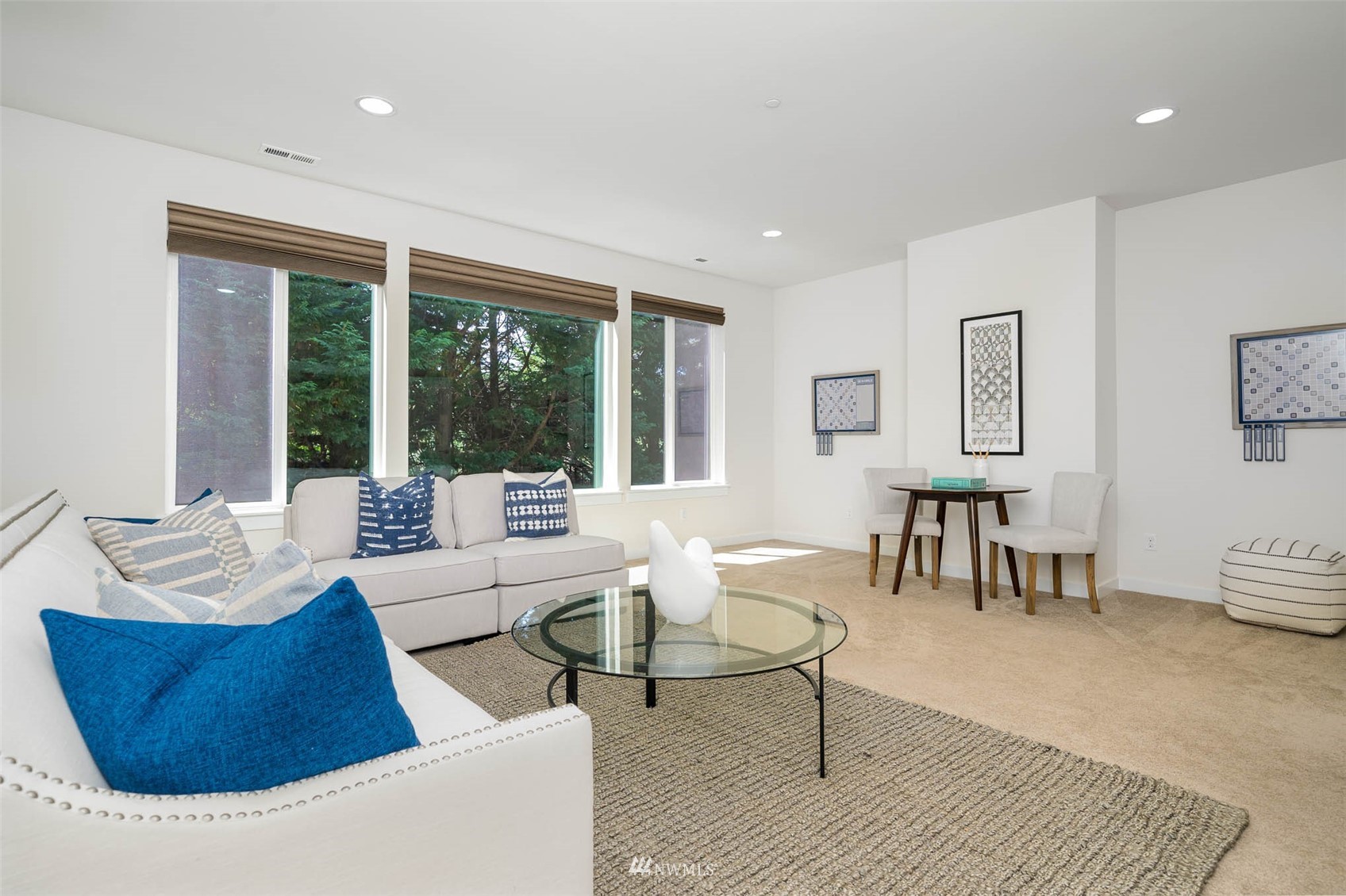 10133 Northeast 147th Street Bothell, WA 98011 - Photo 20 of 39 a living room with furniture and a large window