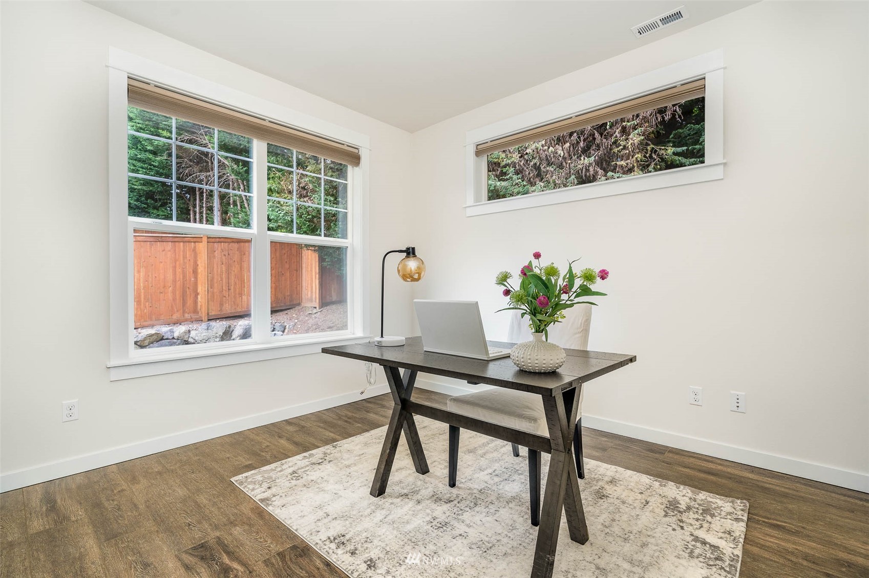 10133 Northeast 147th Street Bothell, WA 98011 - Photo 23 of 39 a workspace with furniture and a window