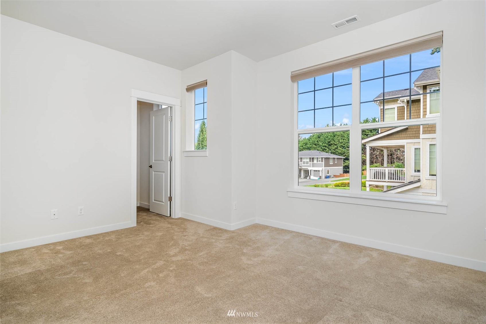 10133 Northeast 147th Street Bothell, WA 98011 - Photo 27 of 39 a view of an empty room with a window