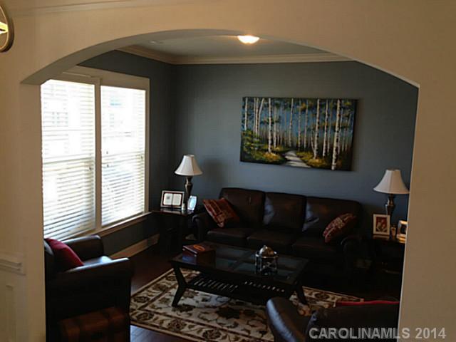 5000 Fallondale Road, Unit 885 Waxhaw, NC 28173 - Photo 4 of 16 a living room with furniture and a window