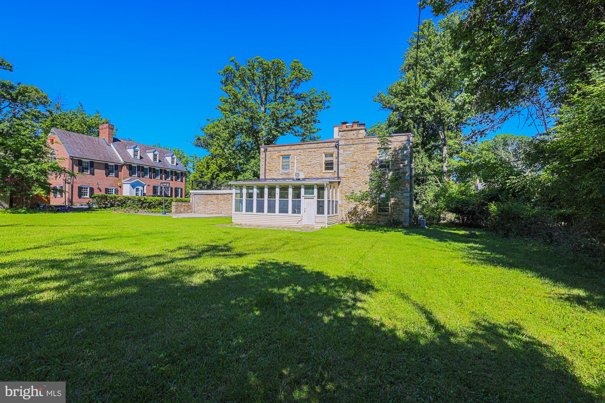 3305 Bancroft Road Baltimore, MD 21215 - Photo 6 of 61 Charming stone home on lush green lawn.