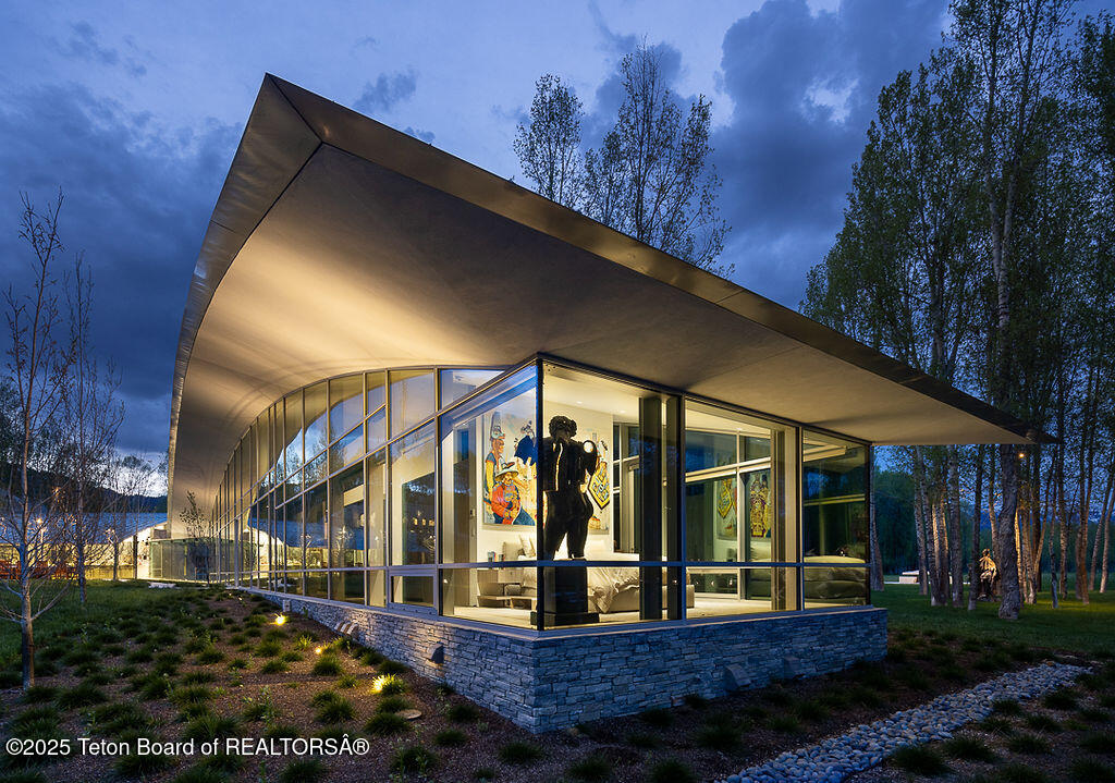1120 Thunder Road Wilson, WY 83014 - Photo 21 of 38 Primary Bedroom Exterior Twilight