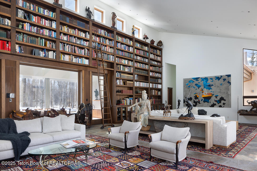 1120 Thunder Road Wilson, WY 83014 - Photo 23 of 38 Living Room with Library