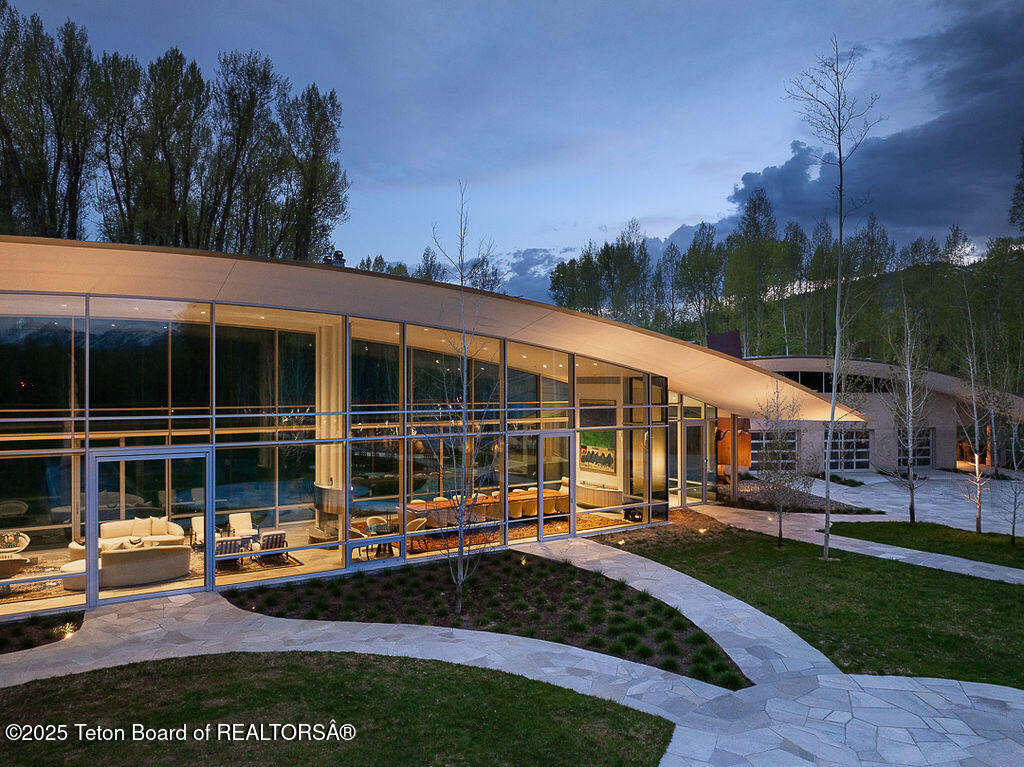 1120 Thunder Road Wilson, WY 83014 - Photo 4 of 38 Front Exterior from Side Twilight