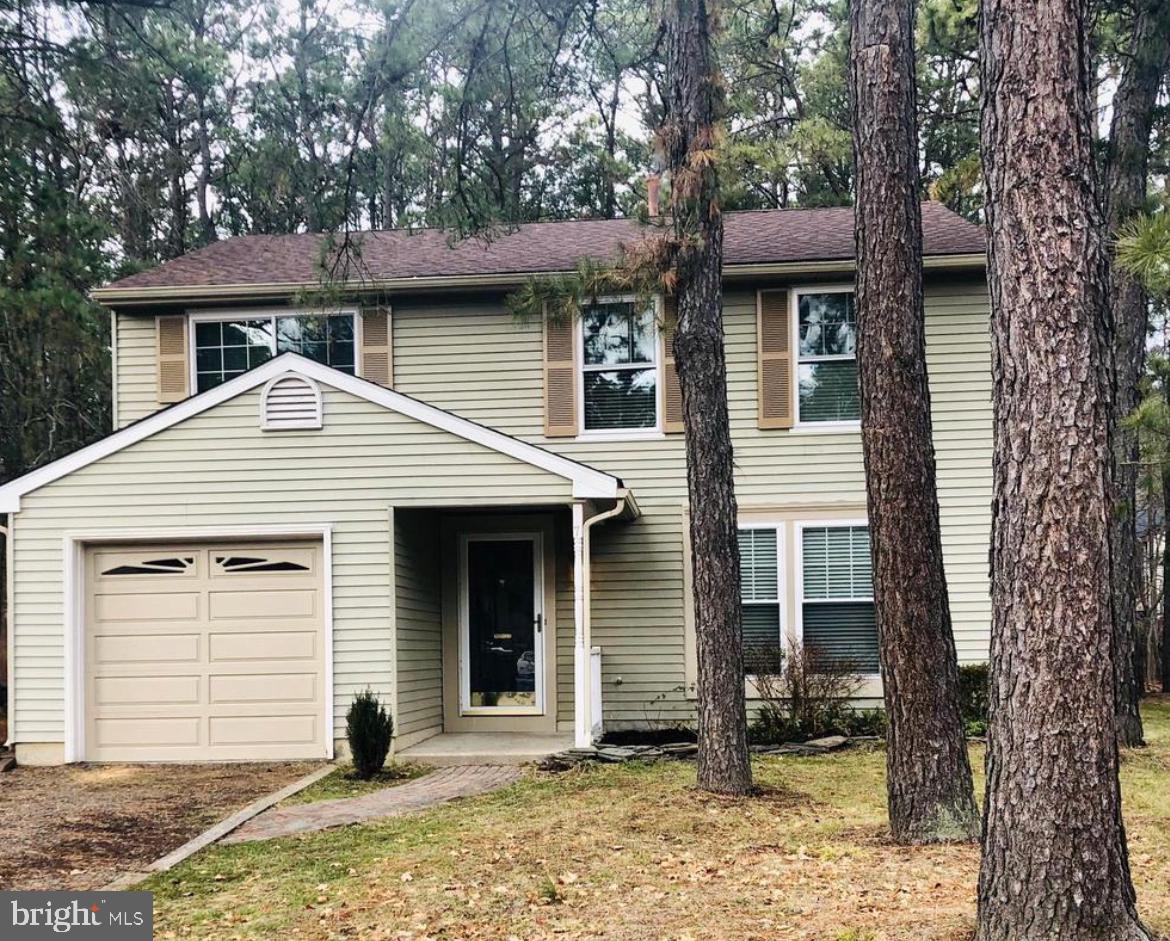 7 Haddon Court Marlton, NJ 08053 - Photo 1 of 8 a front view of a house with a yard