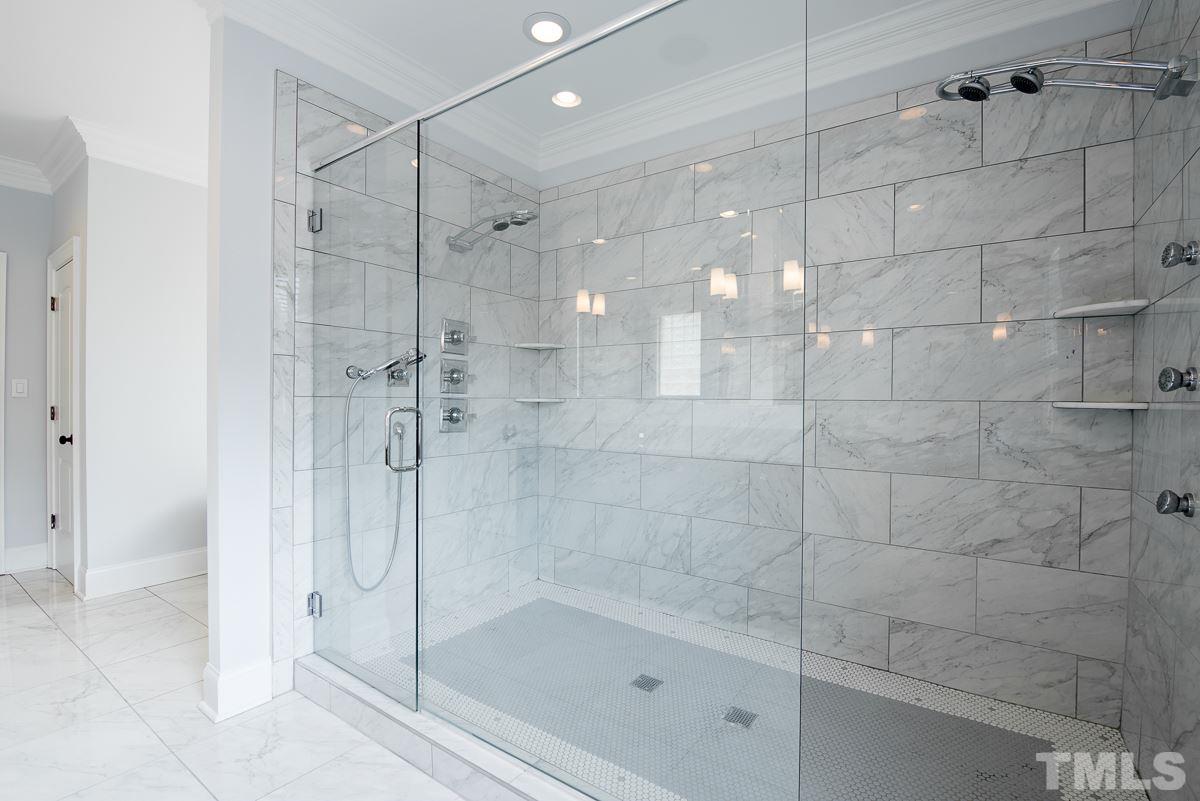 2611 Churchill Road Raleigh, NC 27608 - Photo 22 of 25 a bathroom with a shower