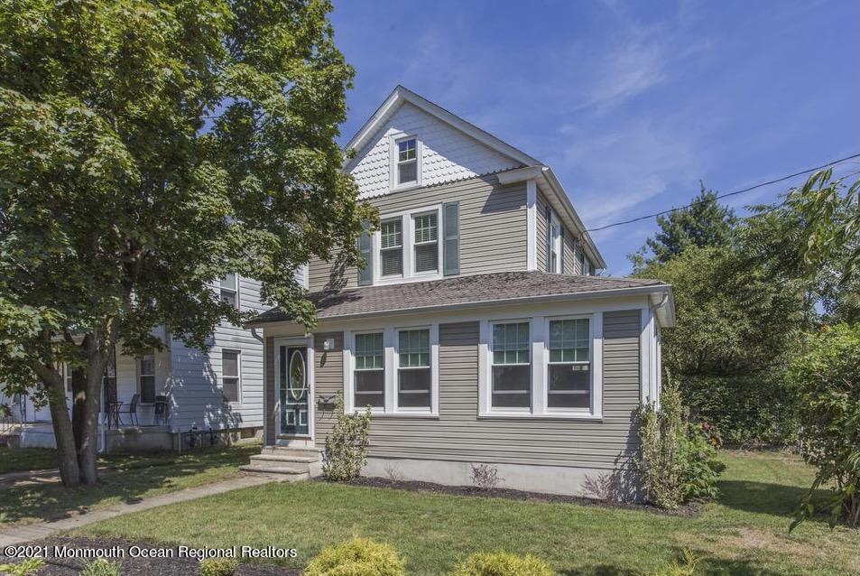 104 Bank Street Red Bank, NJ 07701 - Photo 19 of 33 front view of house with a yard