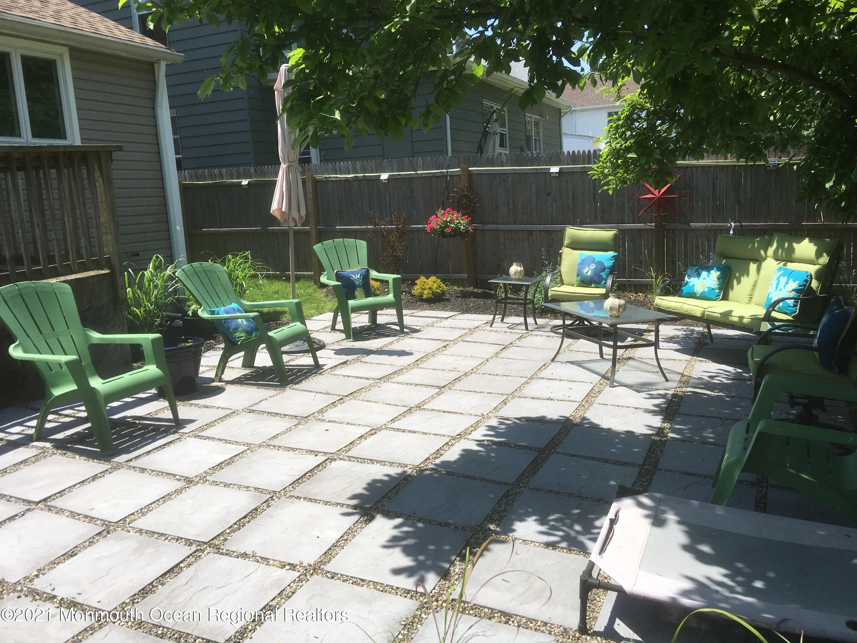 104 Bank Street Red Bank, NJ 07701 - Photo 28 of 33 a view of backyard with sitting area