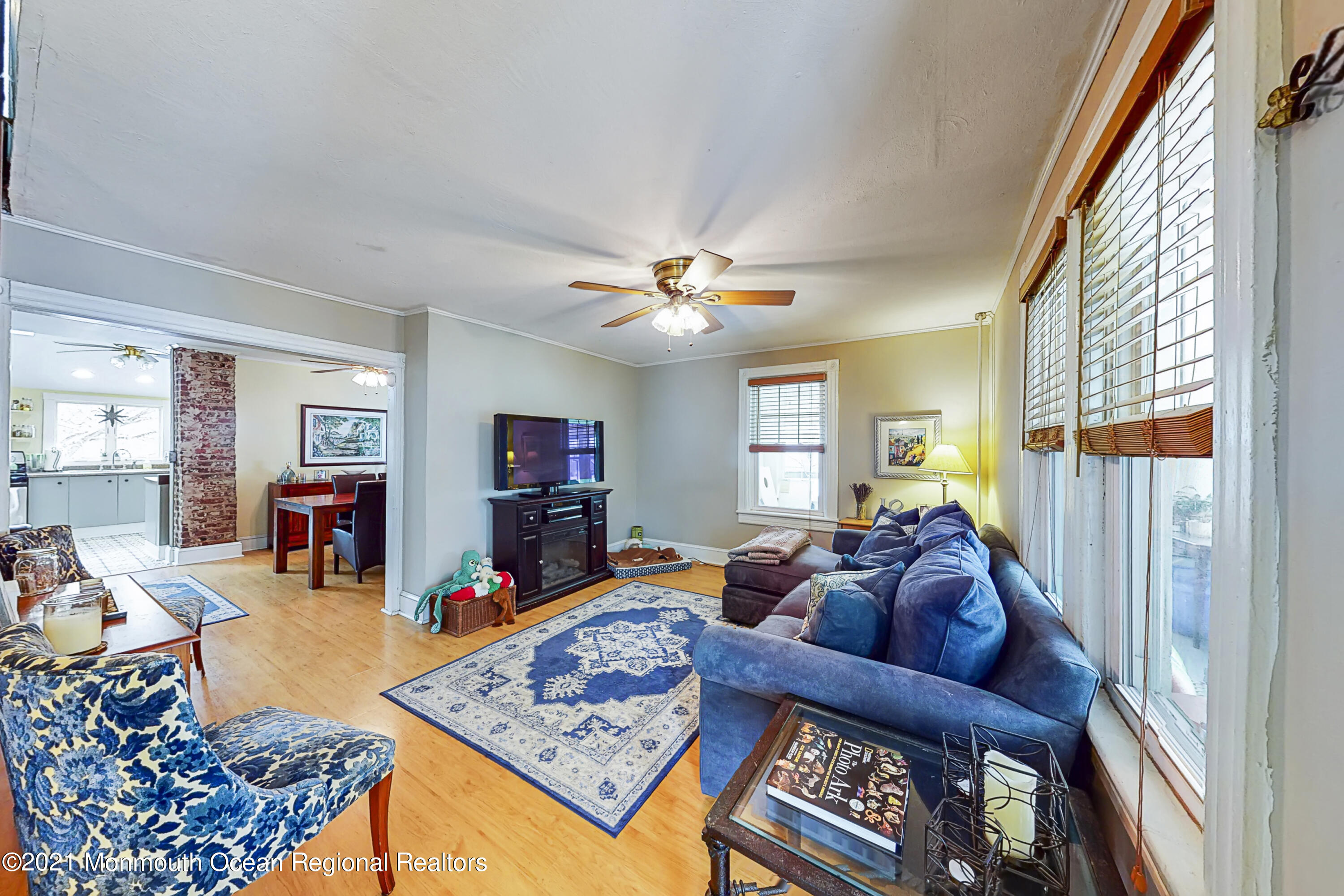 104 Bank Street Red Bank, NJ 07701 - Photo 4 of 33 a living room with furniture and a flat screen tv