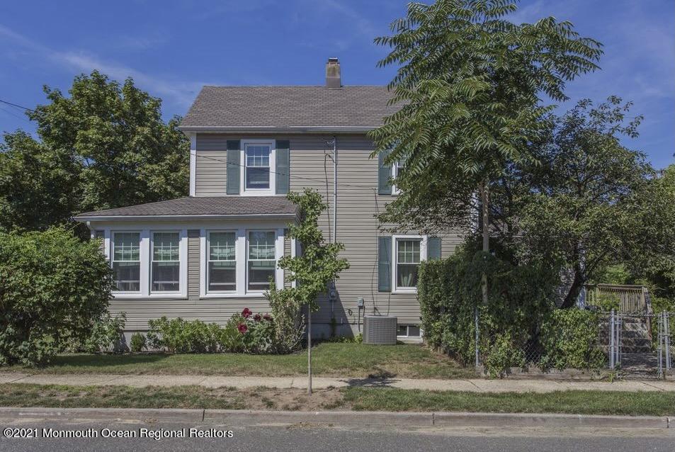 104 Bank Street Red Bank, NJ 07701 - Photo 31 of 33 a front view of a house with a garden