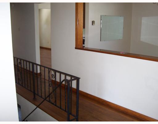 9 Hilltop Acres Road Washington, PA 15301 - Photo 11 of 18 Other. Main floor hallway with hardwood floors and open floor plan.