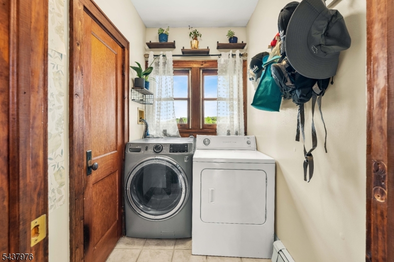 886 Brass Castle Road Belvidere, NJ 07823 - Photo 29 of 44 a utility room with dryer and washer