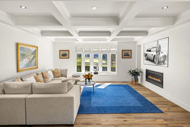 a kitchen with wooden cabinets and center island