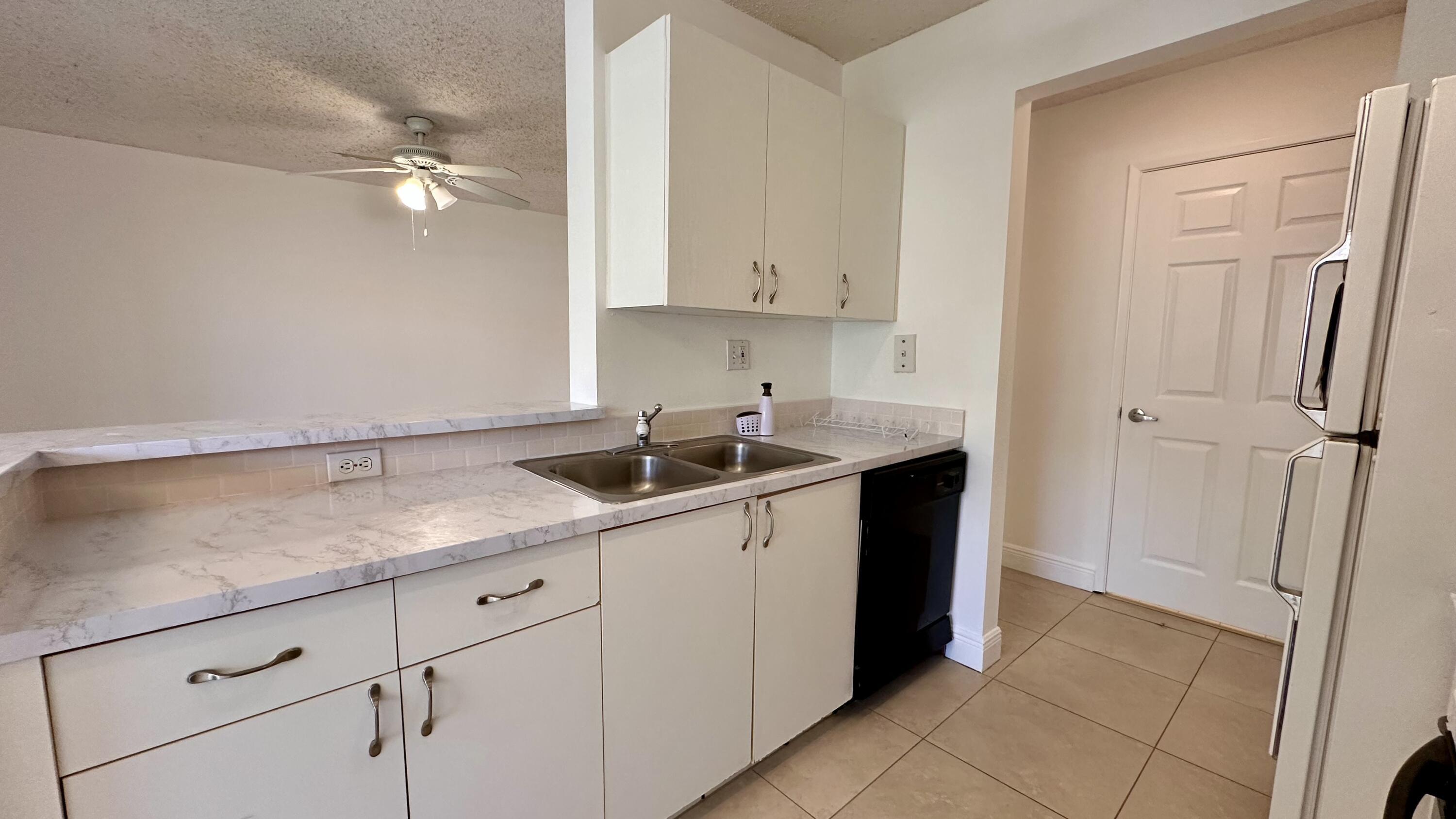 3874 Lyons Road, Unit 1106 Coconut Creek, FL 33073 - Photo 4 of 23 IMG_2400