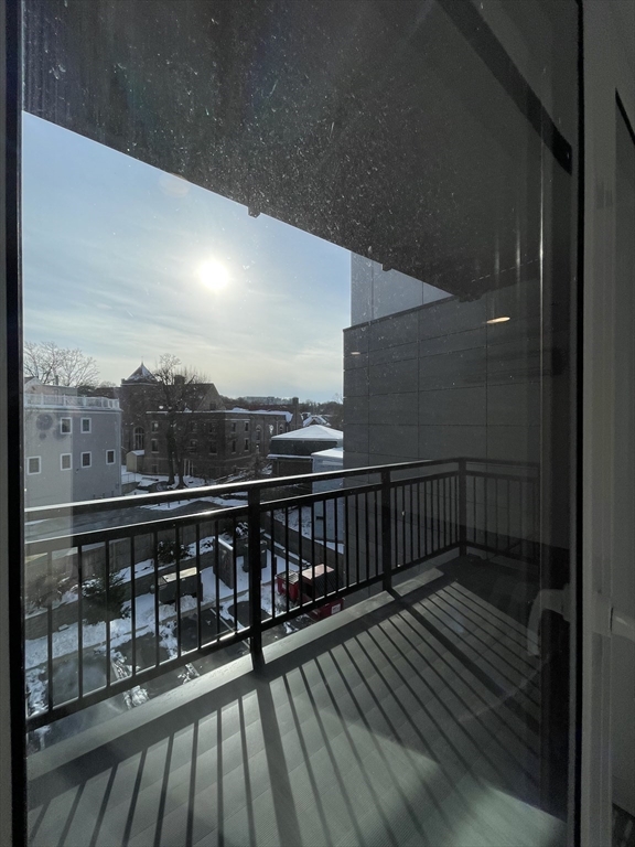 42 North Beacon Street, Unit 406 Boston, MA 02134 - Photo 13 of 14 a view of balcony with furniture