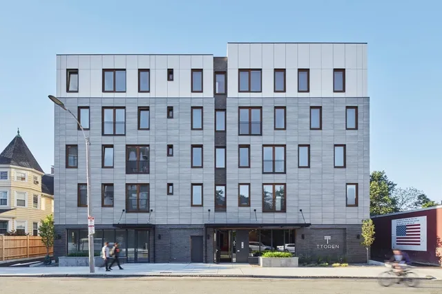 a front view of a building with street