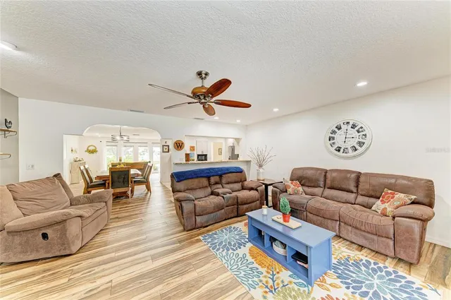 a view of a swimming pool with a patio