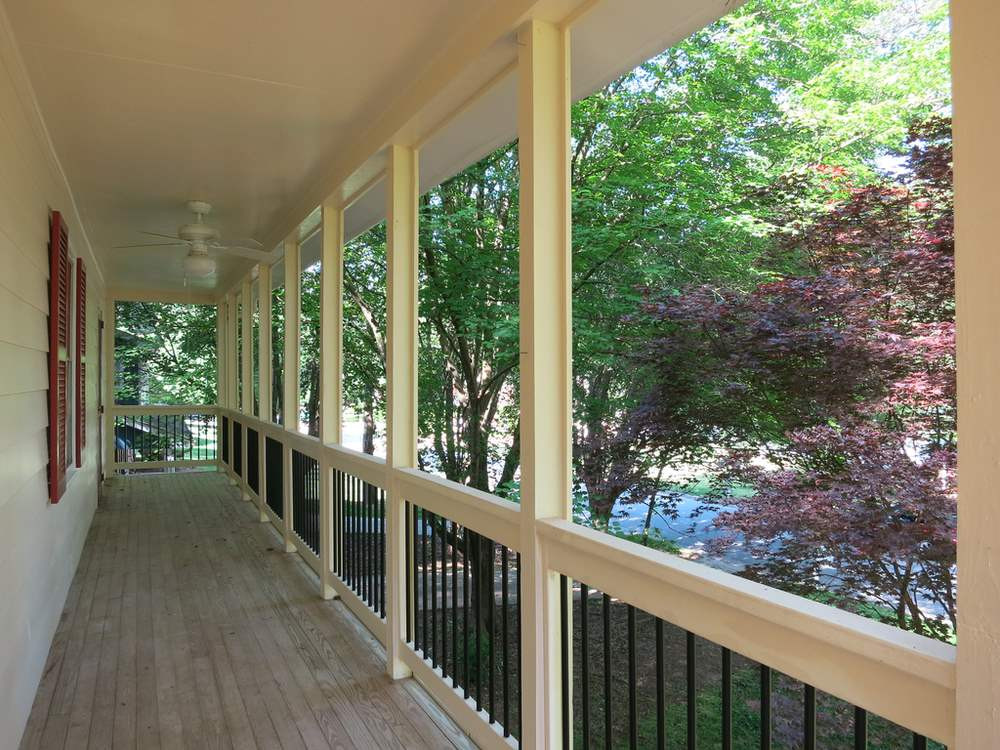 813 Davidson Street Raleigh, NC 27609 - Photo 8 of 30 Wooded view from the upper covered Front Porch. Upper Front Porch
