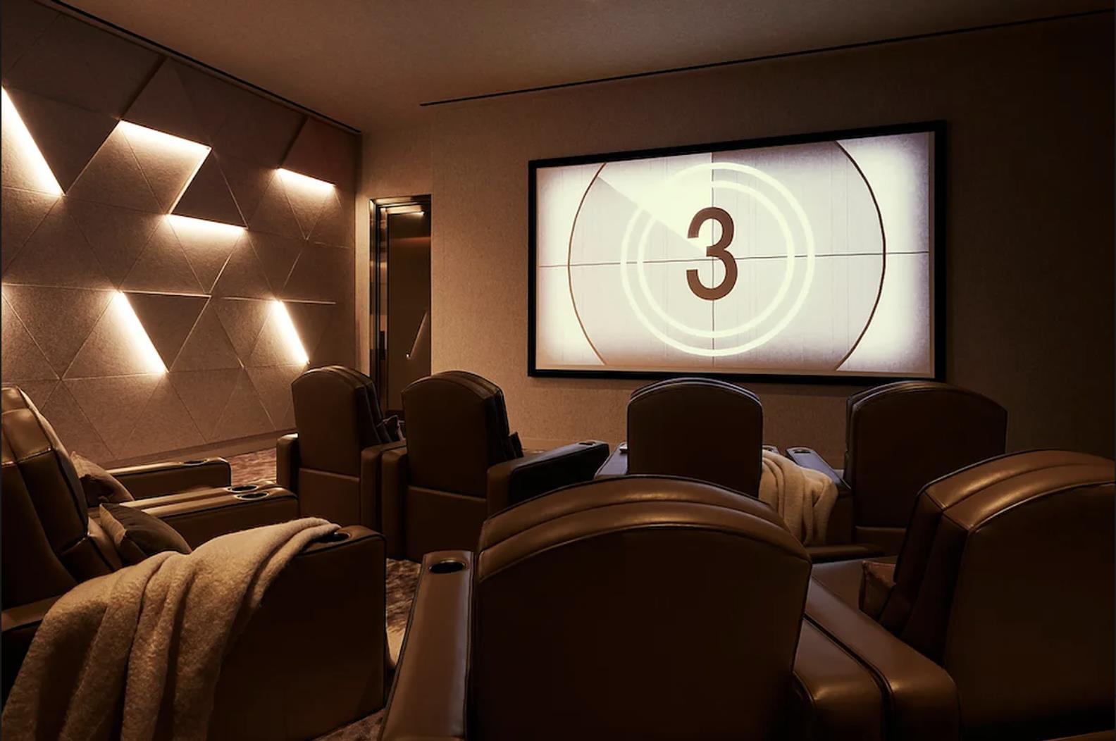 455 10th Avenue, Unit 33L Manhattan, NY 10018 - Photo 11 of 18 a front view of a house with a projector