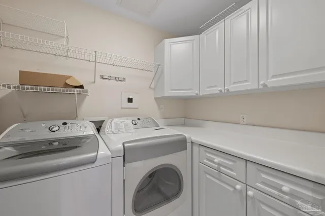 a view of a balcony with wooden floor and fence