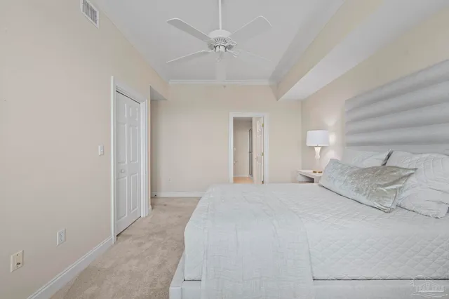 a kitchen with a window and a wooden floor