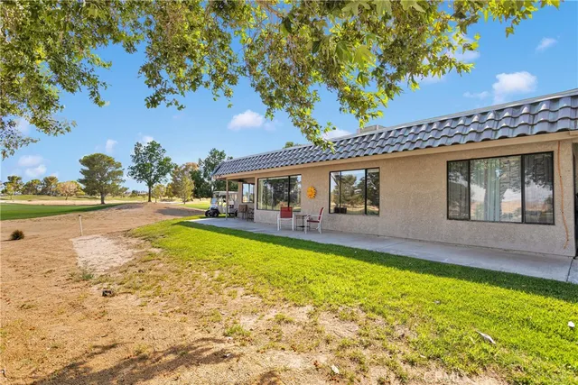a view of a swimming pool with a lounge chairs