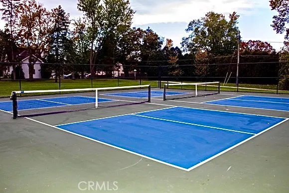 a view of lake with green space