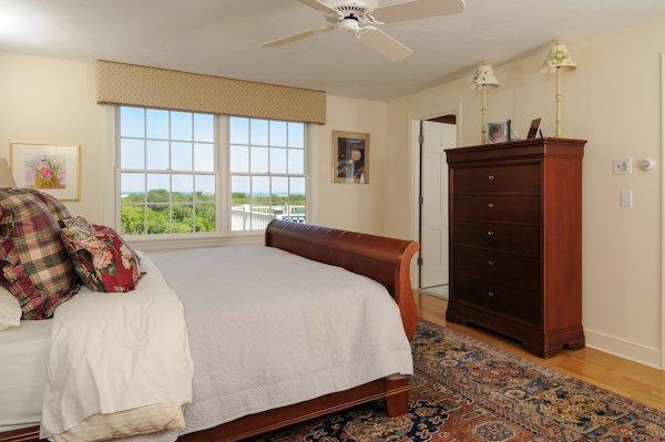 30 Leonard Road East Sandwich, MA 02537 - Photo 11 of 15 a bedroom with a bed and a window