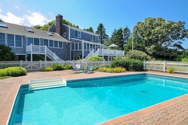30 Leonard Road East Sandwich, MA 02537 - Photo 2 of 15 a view of yard with swimming pool and outdoor seating