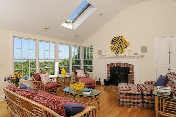 30 Leonard Road East Sandwich, MA 02537 - Photo 5 of 15 a living room with furniture large window and fireplace