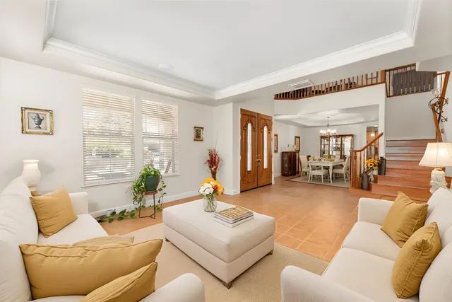 a spacious bedroom with a bed and a couch