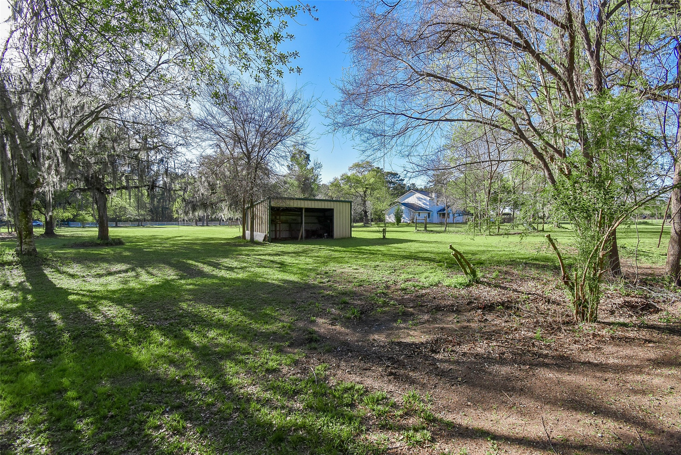 24640 Macedonia Road Hockley, TX 77447 - Photo 37 of 46 a view of a house with a yard