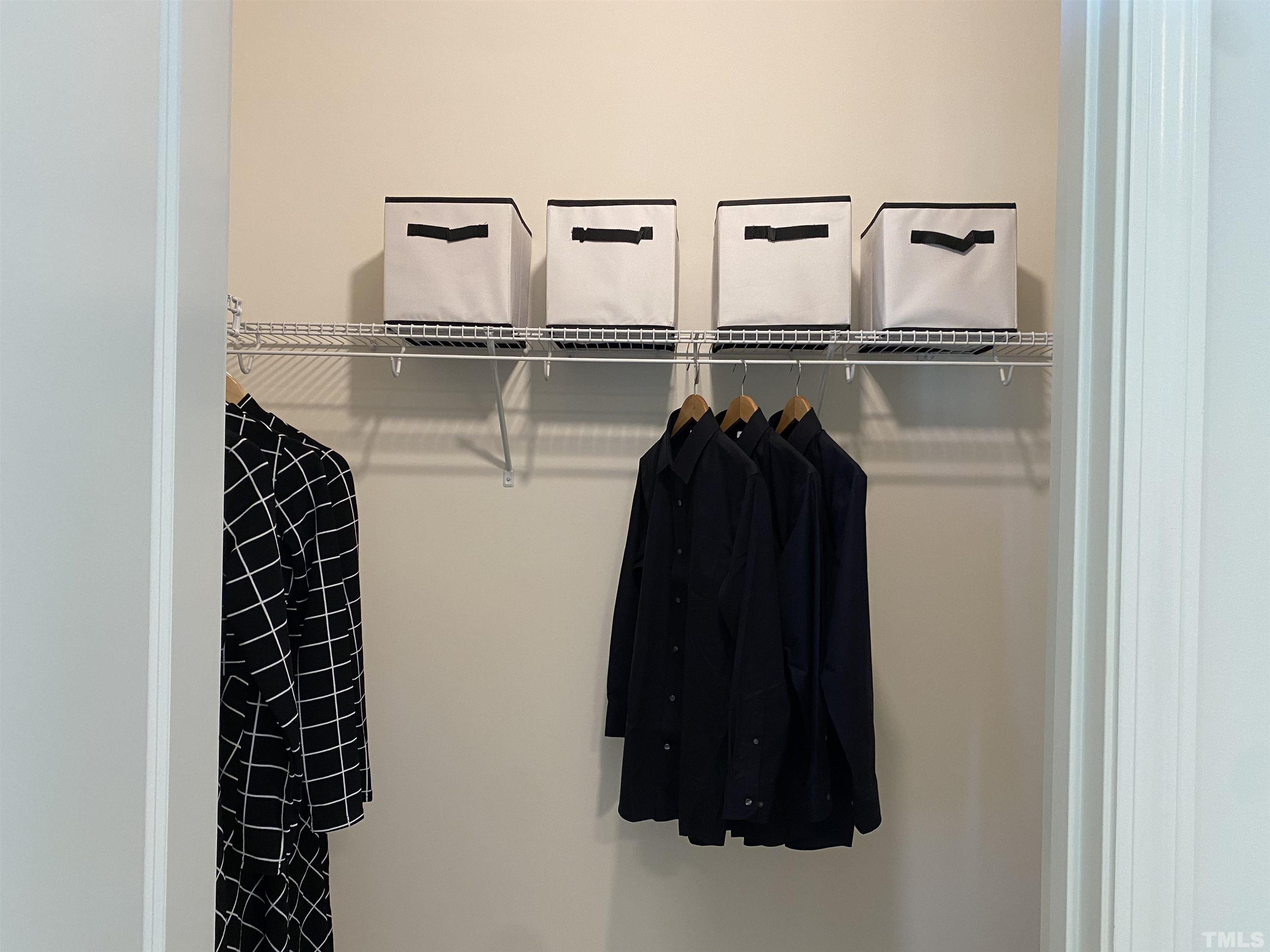 1258 Commack Drive Durham, NC 27703 - Photo 18 of 68 a view of walk in closet with clothes and shoes