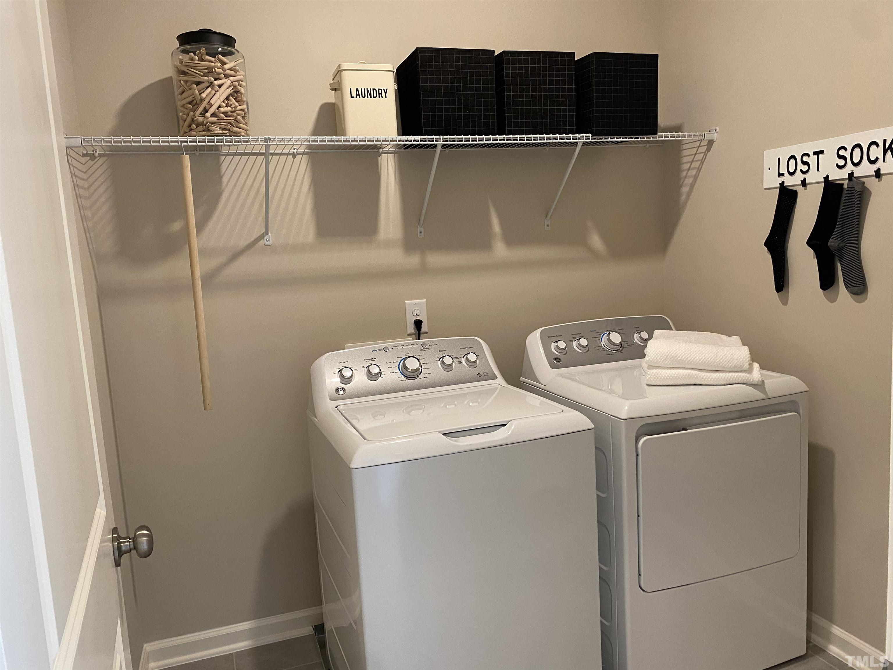 1258 Commack Drive Durham, NC 27703 - Photo 19 of 68 a utility room with dryer and washer
